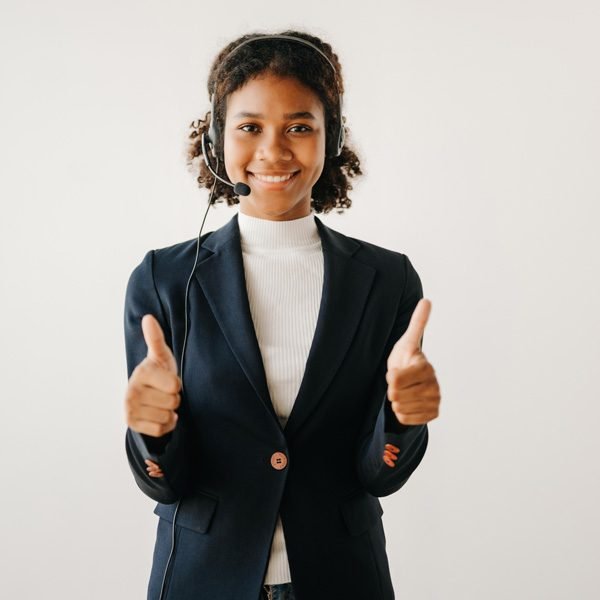 vecteezy_serious-call-center-operator-in-wireless-headset-talking_23351294_391